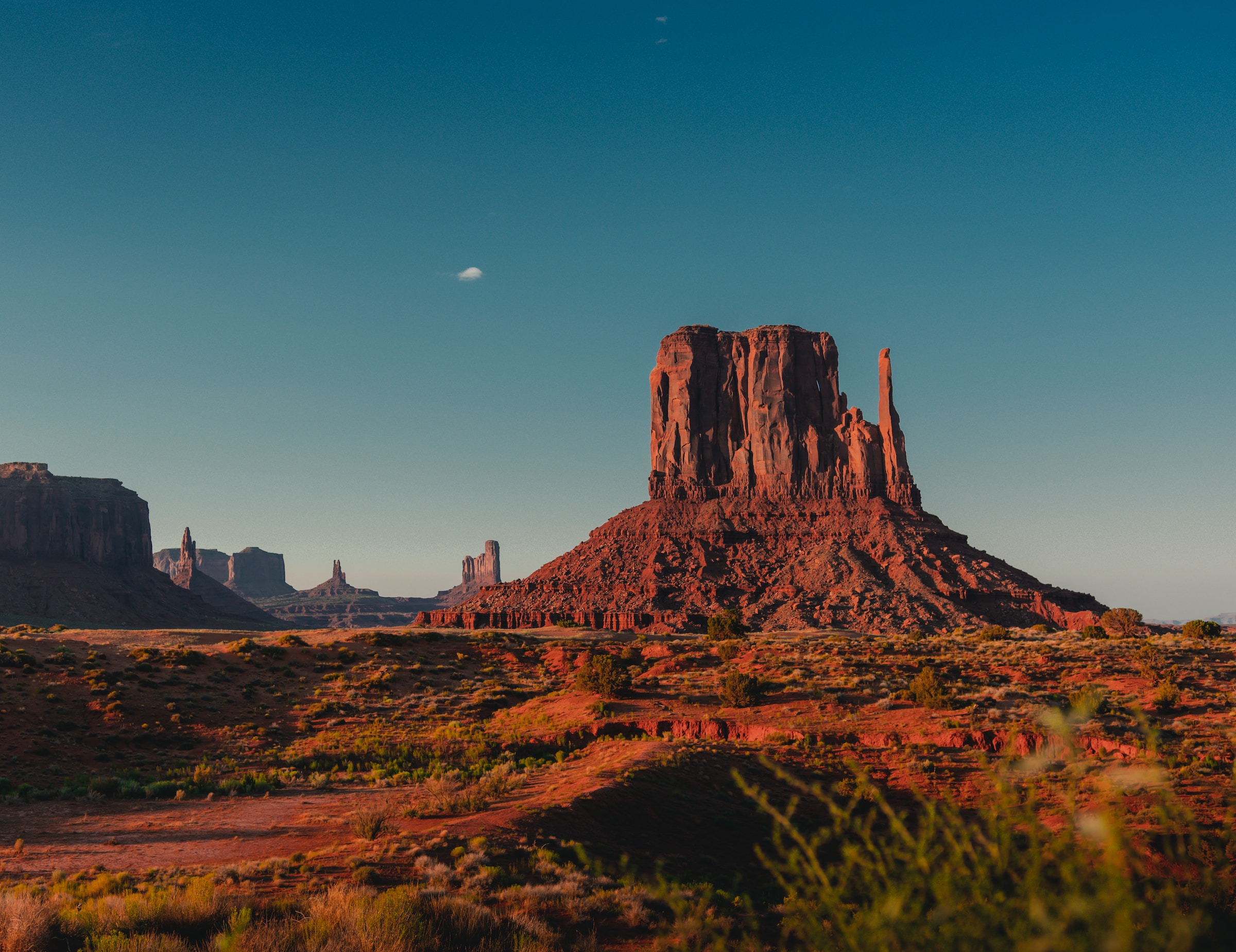 brown rock formation with blue sky